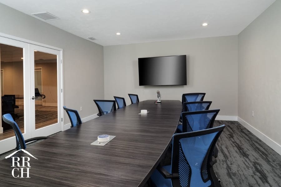 Board Room Inside Commercial Office Renovation Project with Recessed Lighting and Corporate Friendly Carpeting | Robinson Renovation and Custom Homes