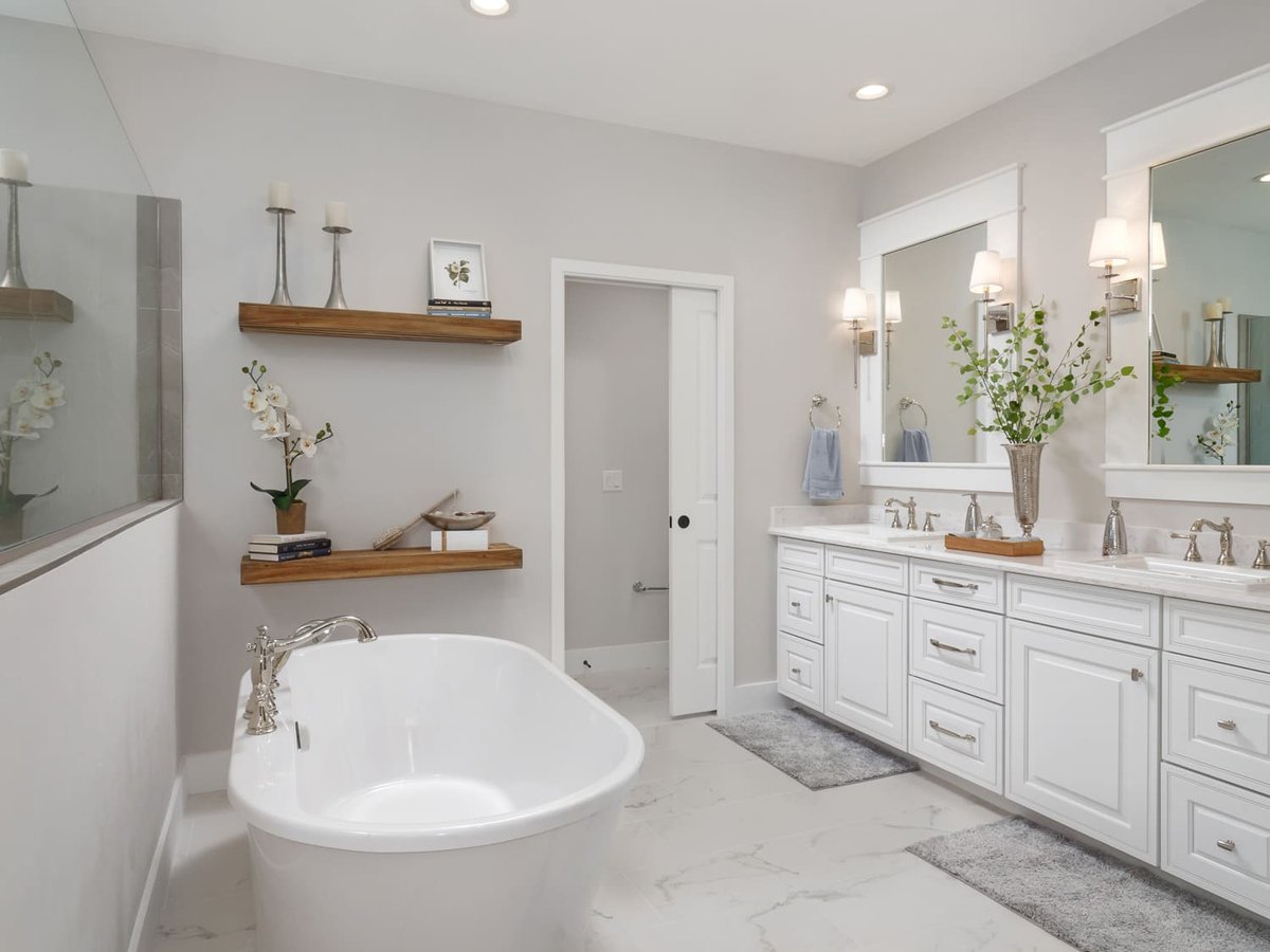 Elegant Bathroom with Standalone Tub Walk-In Shower with Half Wall and Private Toilet Area | RRCH, Inc.