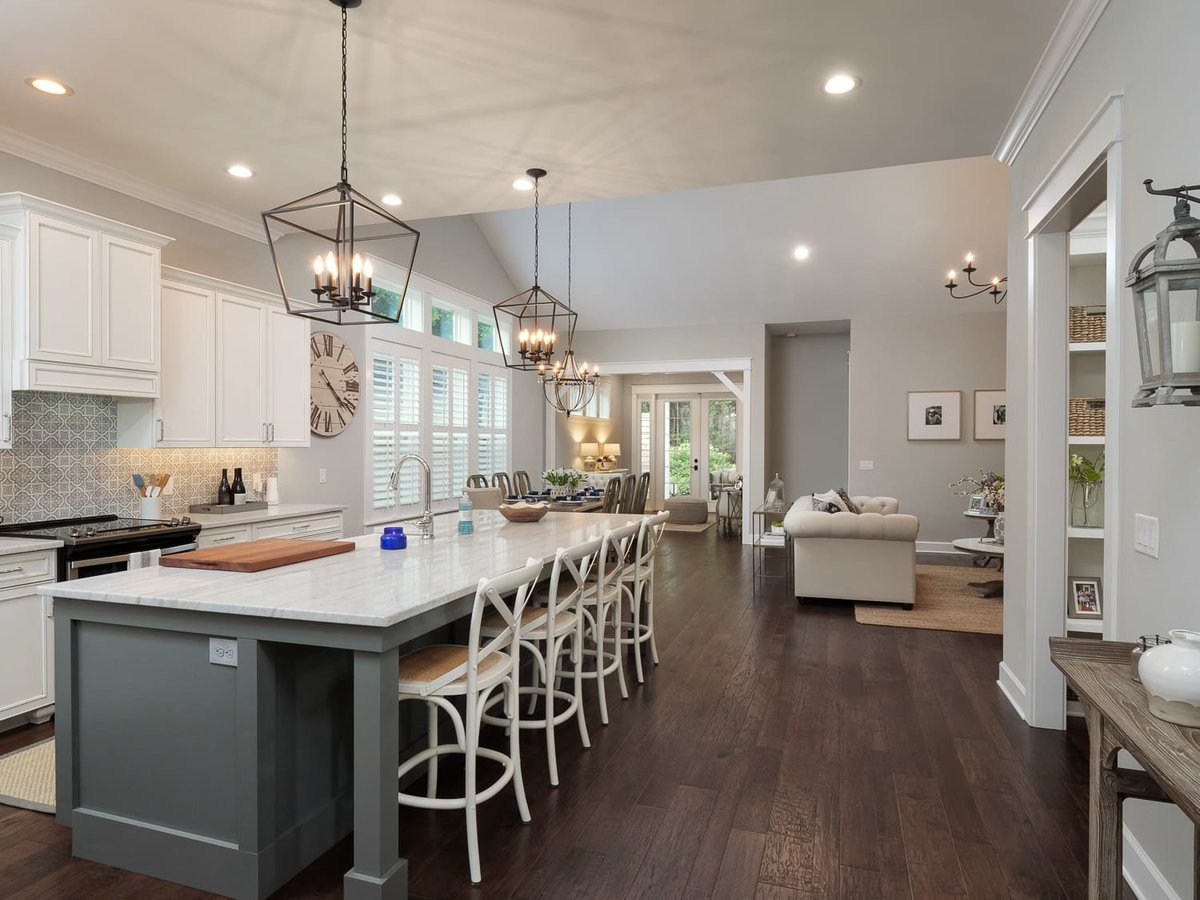 Open Concept Living Kitchen and Dining Area Into Living Room with Modern Farmhouse Accent Lighting and Large Eat-In Island | RRCH, Inc.