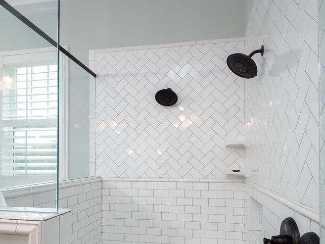 Walk-In Shower with Geometric Subway Tiling Matte Black Fixtures Modern Bathroom Mill Creek Estates